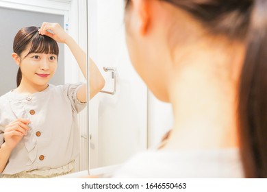 Young Woman Setting Her Hair