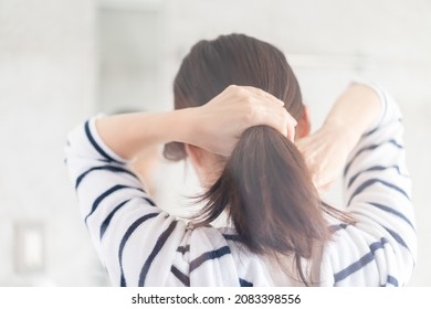 Young Woman Setting Her Hair