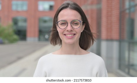 Young Woman Shaking Head As Yes, Approval