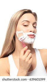 Young Woman Shaving Face On White Background