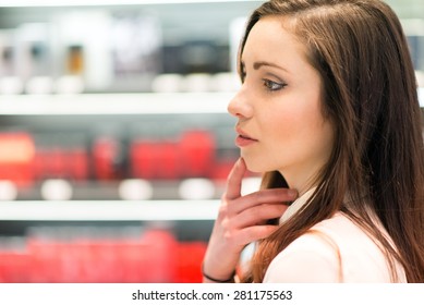 Young Woman Shopping In A Beauty Shop