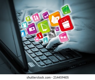 Young woman shopping online by using laptop