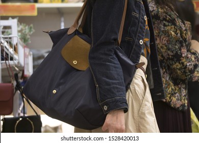 Young Woman Shopping With Shoulder Bag
