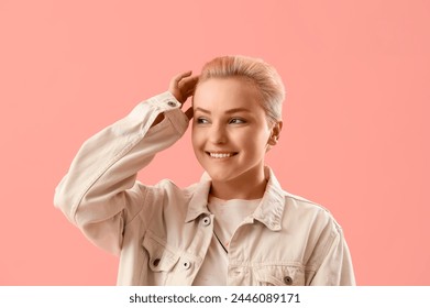 Young woman with short hair on pink background, closeup - Powered by Shutterstock