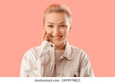 Young woman with short hair on pink background, closeup - Powered by Shutterstock