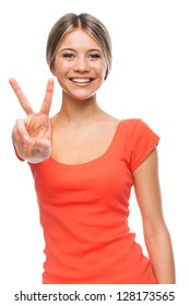 Young Woman Showing Two Fingers, Positive Or Peace Gesture, On White