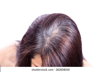 Young Woman Shows Her Gray Hair Roots