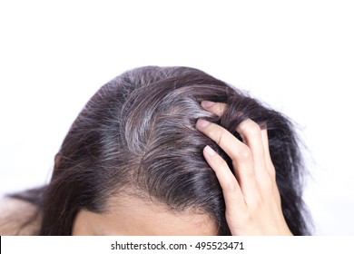 Young Woman Shows Her Gray Hair Roots