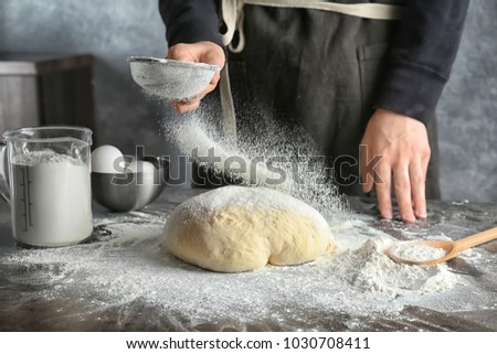 Similar – Foto Bild Frau beim Kneten von handwerklichem Brot auf Holztisch