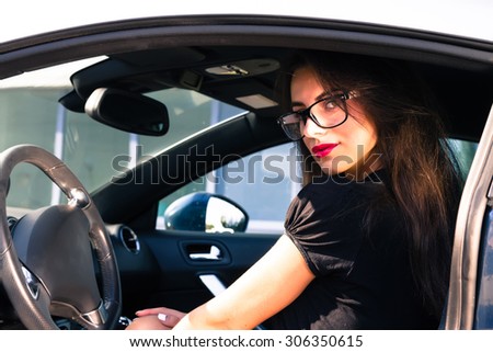 https://image.shutterstock.com/image-photo/young-woman-sitting-carportrait-sexy-450w-306350615.jpg