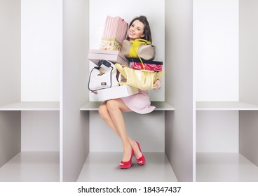 Young woman sitting in a changing room