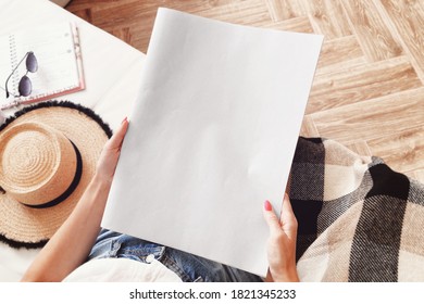 Young Woman Sitting In Living Room And Reading A Newspaper Mockup.