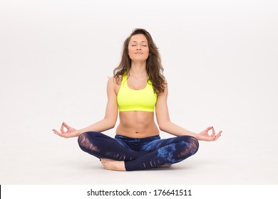 Young Woman Sitting In Lotus Position