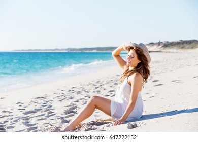 Young Woman Sitting On Beach Stock Photo 647222152 | Shutterstock