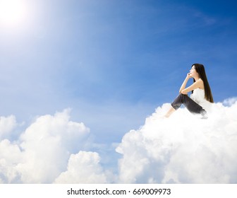 someone sitting on clouds