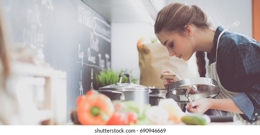 Young Woman Sitting On Table Kitchen Stock Photo 690946669 | Shutterstock
