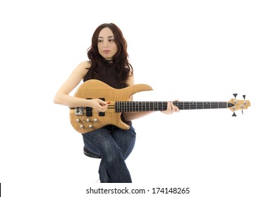 Young Woman Sitting And Playing Bass Guitar (Series With The Same Model Available)