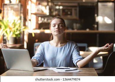 Young Woman Sitting In Public Place Take Break Distracted From Work Or Study Do Yoga Exercise Meditation Practice. No Stress Negative Emotions Relieve, Good Healthy Life Habit Internal Balance Concept