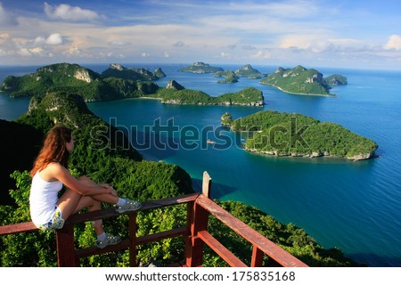 Young woman sitting at the view point, Wua Talab island, Ang Thong National Marine Park, Thailand