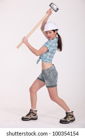 Young Woman With A Sledgehammer