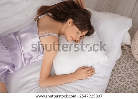 Similar – Image, Stock Photo Young woman sleeping on comfortable sofa with cushion at home