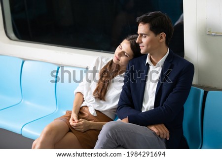 Similar – Image, Stock Photo Side view of loving couple looking at each other