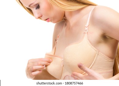 Young Woman Small Boobs Wearing Too Big Bra Cups. Female Breast Wrong Size Lingerie. Bosom, Brafitting And Underwear Concept.