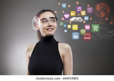 Young woman in smart glasses with virtual screen