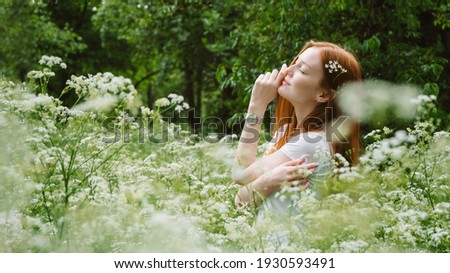 Young Woman smiling arms raised up, enjoy nature, celebrating freedom on green tree background. Positive human emotions. Daily Affirmations, Improve Life, Power of Positivity. 