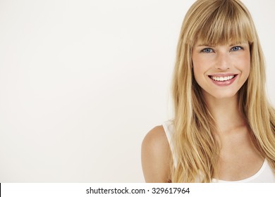 Young Woman Smiling At Camera, Portrait