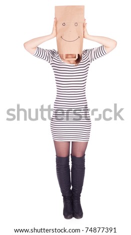young woman in smiling ecological paper bag on head, series