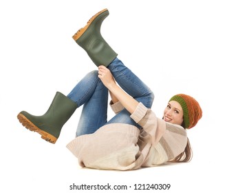 women putting on boots