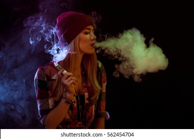 Young Woman Smoking Electronic Cigarette