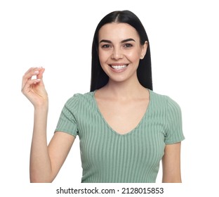 Young Woman Snapping Fingers On White Background