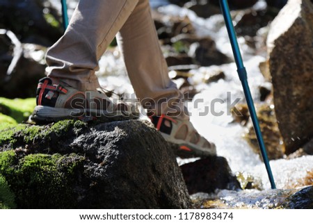 Young woman with sneakers walking nature. Healthy lifestyle concept
