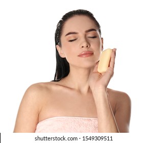 Young Woman With Soap Bar On White Background