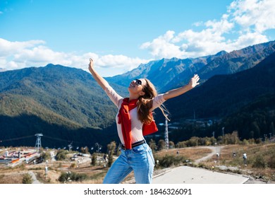 Young Woman In Sochi With Mountain View On The Background, Russia.