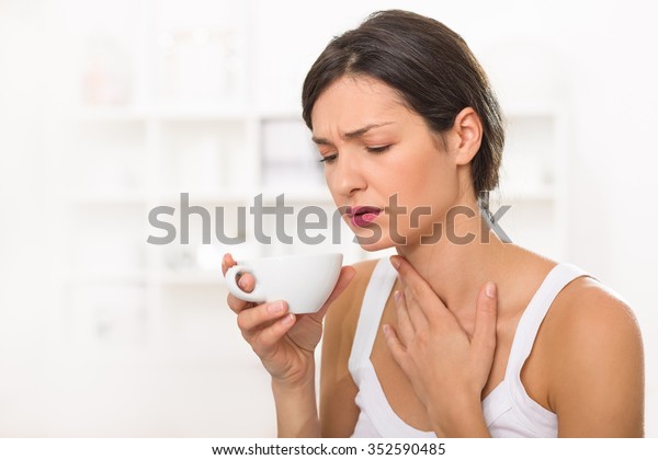 Young Woman Sore Throat Drinking Tea Stock Photo (Edit Now