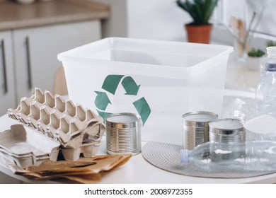  Young Woman Sorting Waste At Home, Storage And Recycling Concept, Copy Space
