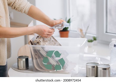  Young Woman Sorting Waste At Home, Storage And Recycling Concept, Copy Space
