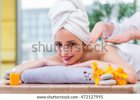 Young woman in spa concept 