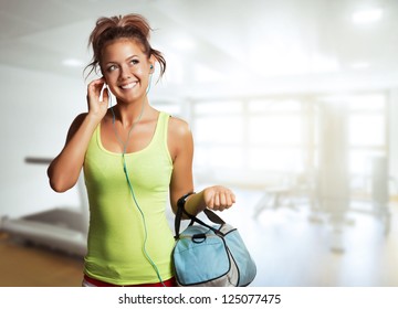 Young Woman In Sport Wear Walking In Gym