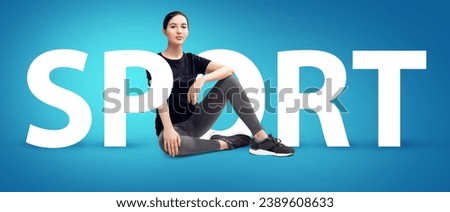 Young woman in sportswear resting among big tag word SPORT. Over blue background.