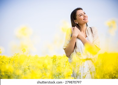 Young Woman In The Spring Field