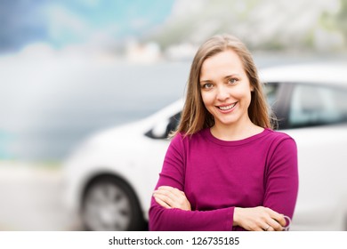 Young Woman Standing Near New Car