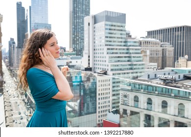 Young Woman Standing On Rooftop Restaurant In New York City NYC At Wedding Reception Thinking Looking At Cityscape Skyscrapers