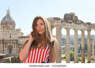 Young woman standing in ruins of Roman Forum background in Rome, Italy. Concept of antique european landmarks and last minute tours. - Shutterstock ID 1121663264