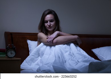 Young Woman Staying Awake In Bed At Night