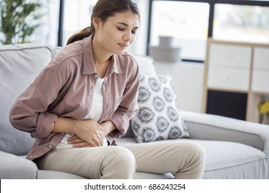 Young Woman With Stomach Pain