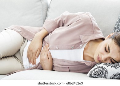 Young Woman With Stomach Pain